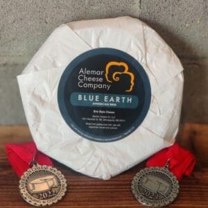 Alemar Blue Earth Cheese packaged wheel with two medals